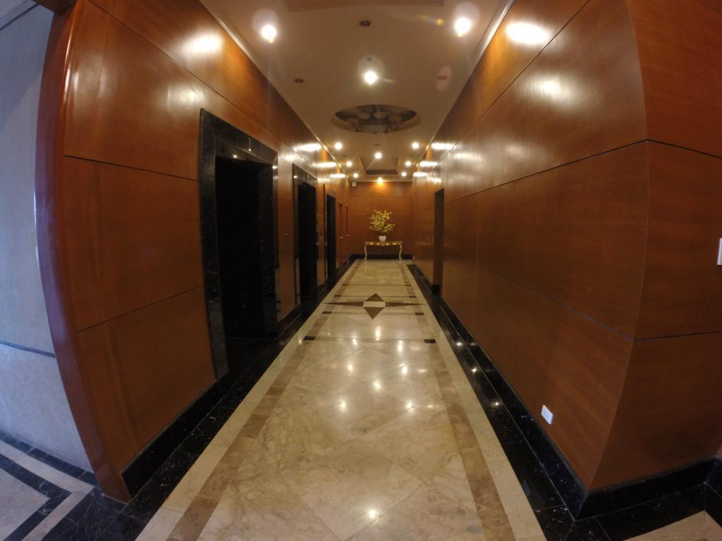 Burgundy Mckinley Place Service Apartment Манила Экстерьер фото